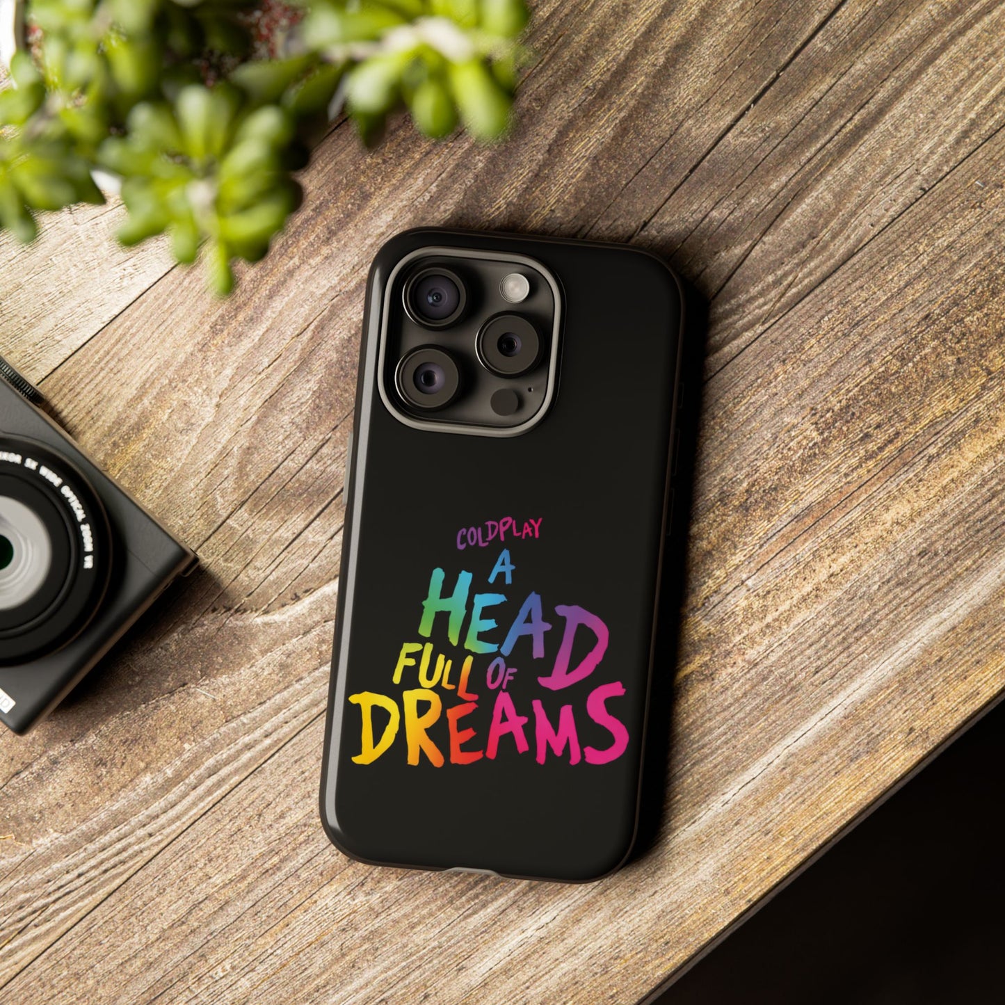 Premium Tough Case for iPhone 12 to 16 Pro Max Showcasing Coldplay’s Iconic A Head Full of Dreams
